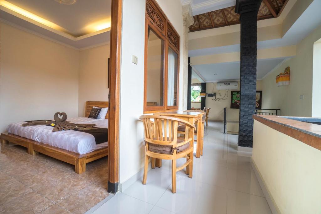 Postel nebo postele na pokoji v ubytování Baba Homestay