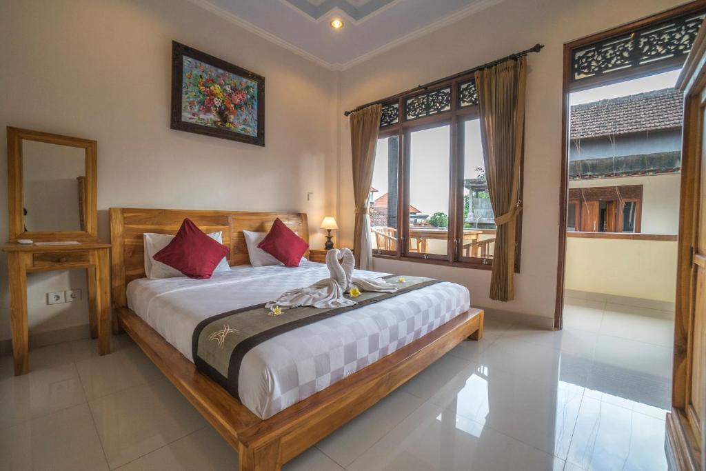 Postel nebo postele na pokoji v ubytování Baba Homestay