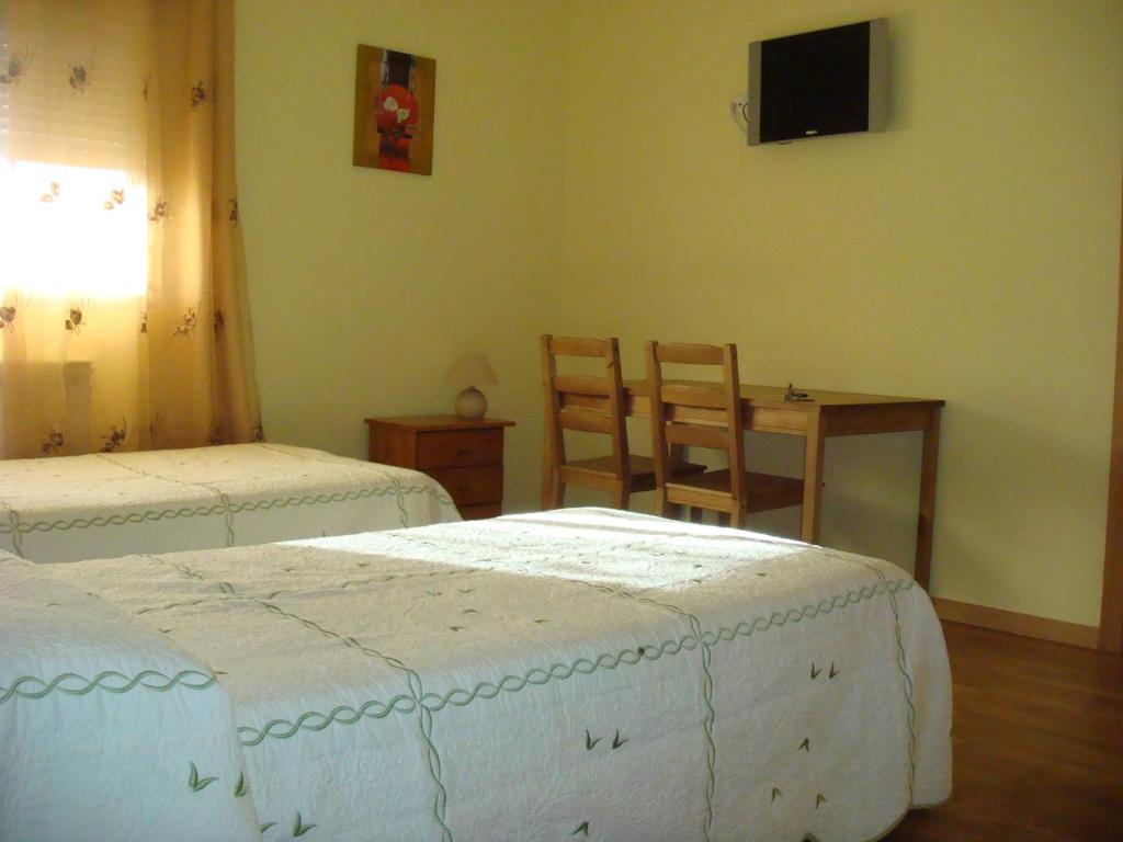 Postel nebo postele na pokoji v ubytování Hostal Madrid Paris