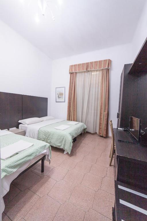 Lemei House - Quadruple Room With Private Bathroom