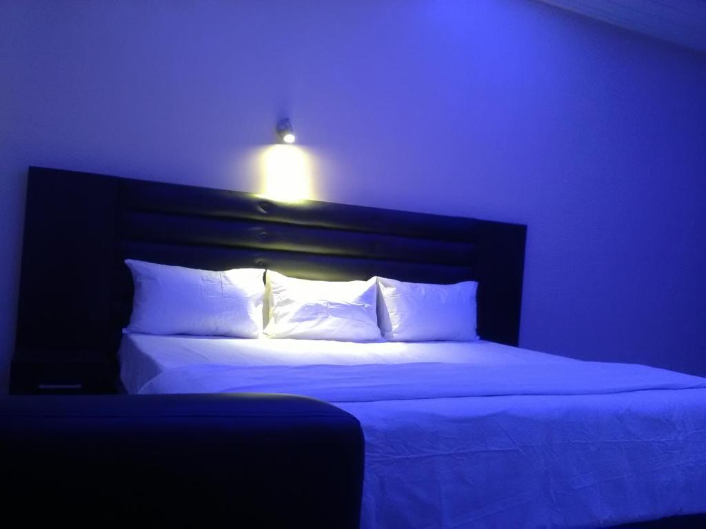 Postel nebo postele na pokoji v ubytování House X