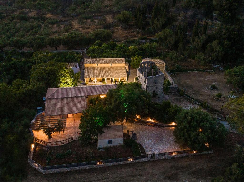 an aerial view of a house with lights on it at Flabouriaris Estate in Anafonítria