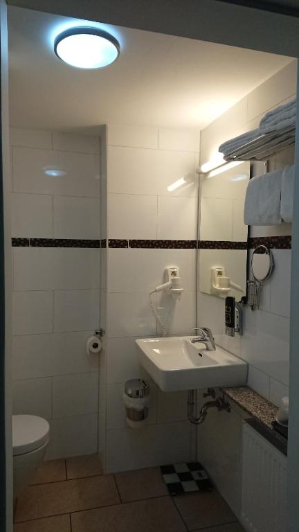 Koupelna v ubytování Rugs Hotel Düsseldorf