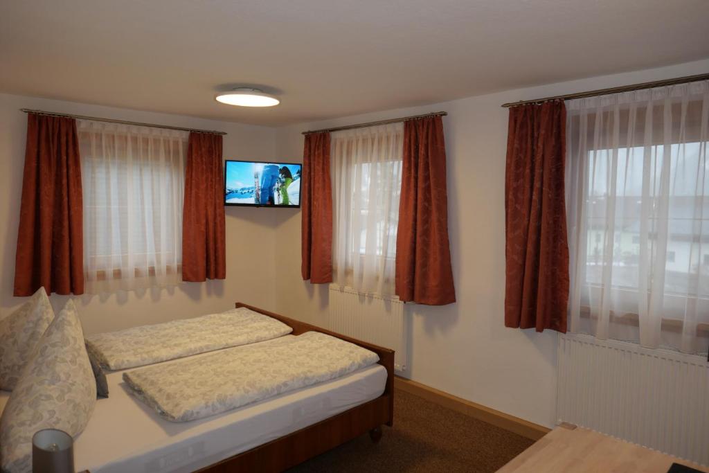 Postel nebo postele na pokoji v ubytování Chalet & Almhostel Alpenperle - Selbstversorger Unterkunft