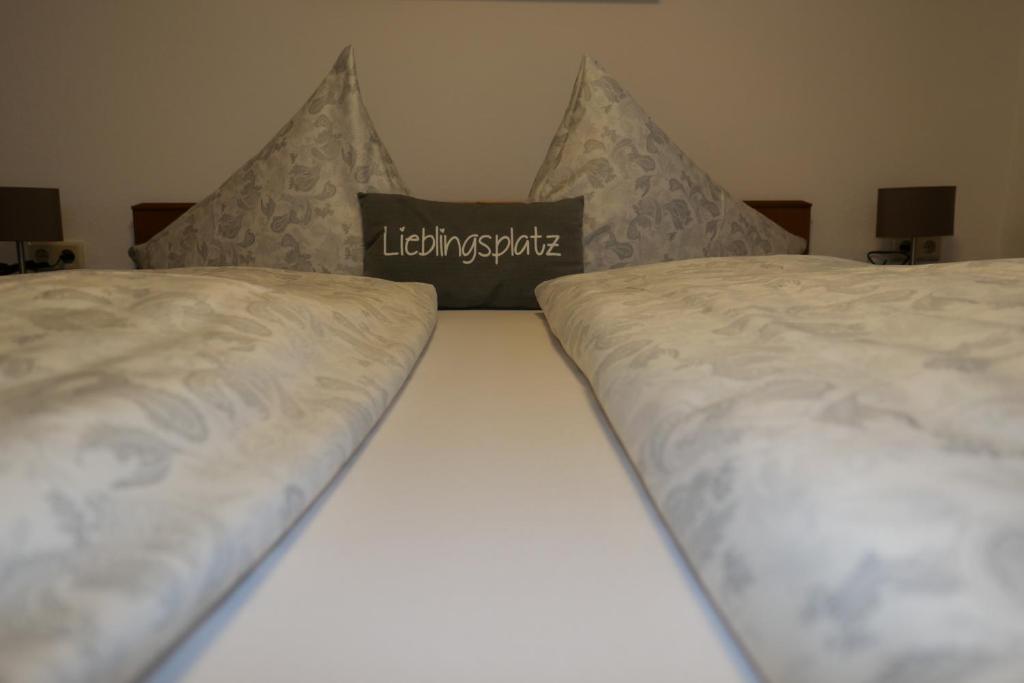 Postel nebo postele na pokoji v ubytování Chalet & Almhostel Alpenperle - Selbstversorger Unterkunft