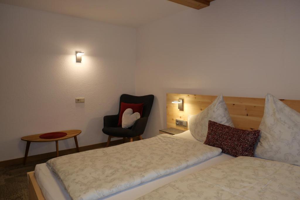 Postel nebo postele na pokoji v ubytování Chalet & Almhostel Alpenperle - Selbstversorger Unterkunft