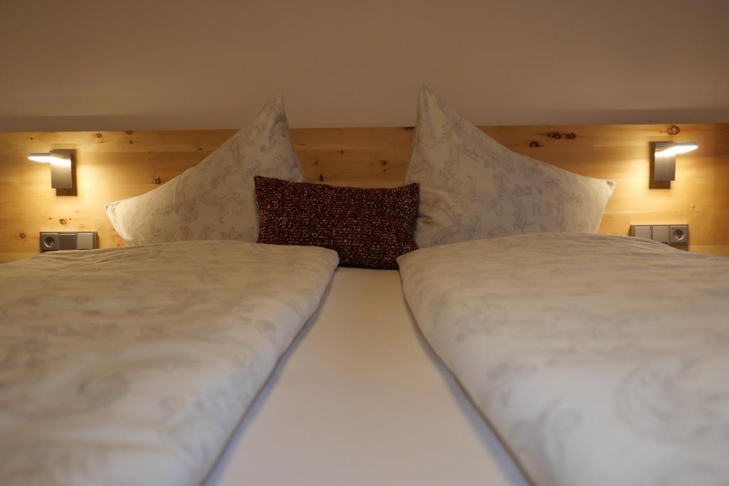 Postel nebo postele na pokoji v ubytování Chalet & Almhostel Alpenperle - Selbstversorger Unterkunft