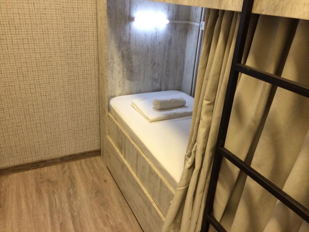 Postel nebo postele na pokoji v ubytování Legvi hostel