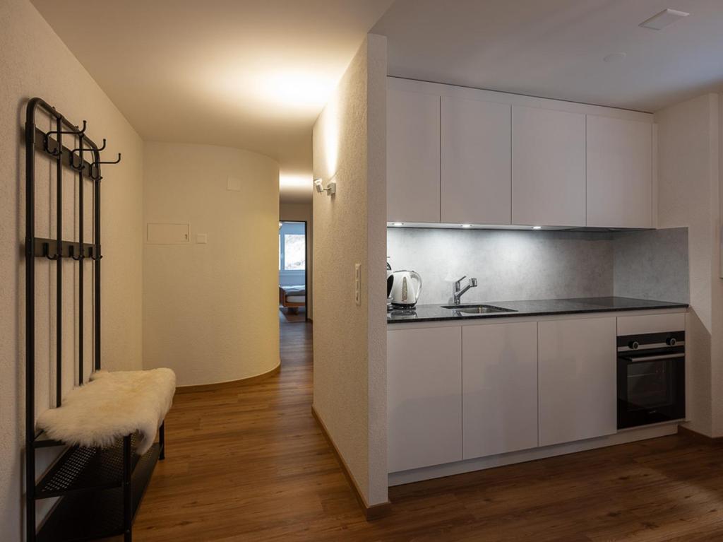 Kuchyň nebo kuchyňský kout v ubytování Malteserhaus Zermatt