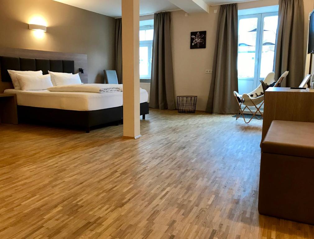 Postel nebo postele na pokoji v ubytování Gasthaus Schwan