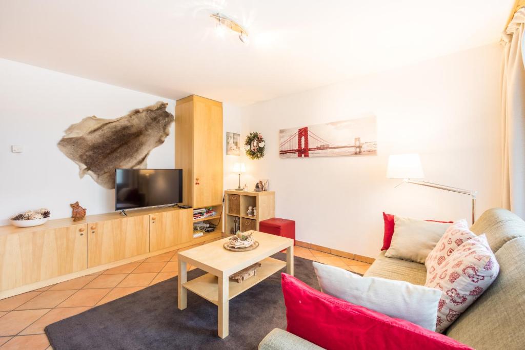 TV a/nebo společenská místnost v ubytování LAAX Homes - Val Mulin 14,1 - Accernero