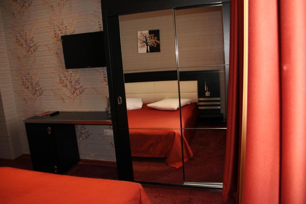 Postel nebo postele na pokoji v ubytování Hotel Villa Palace