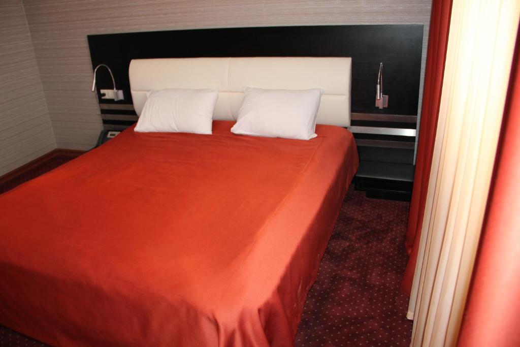 Postel nebo postele na pokoji v ubytování Hotel Villa Palace