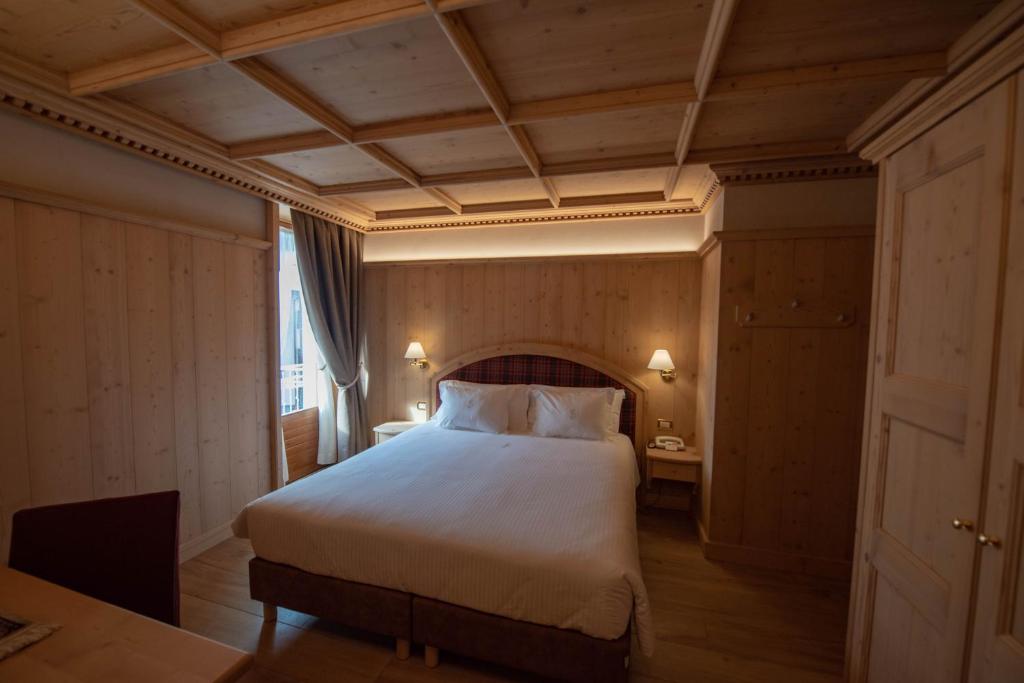 Postel nebo postele na pokoji v ubytování Hotel San Lorenzo