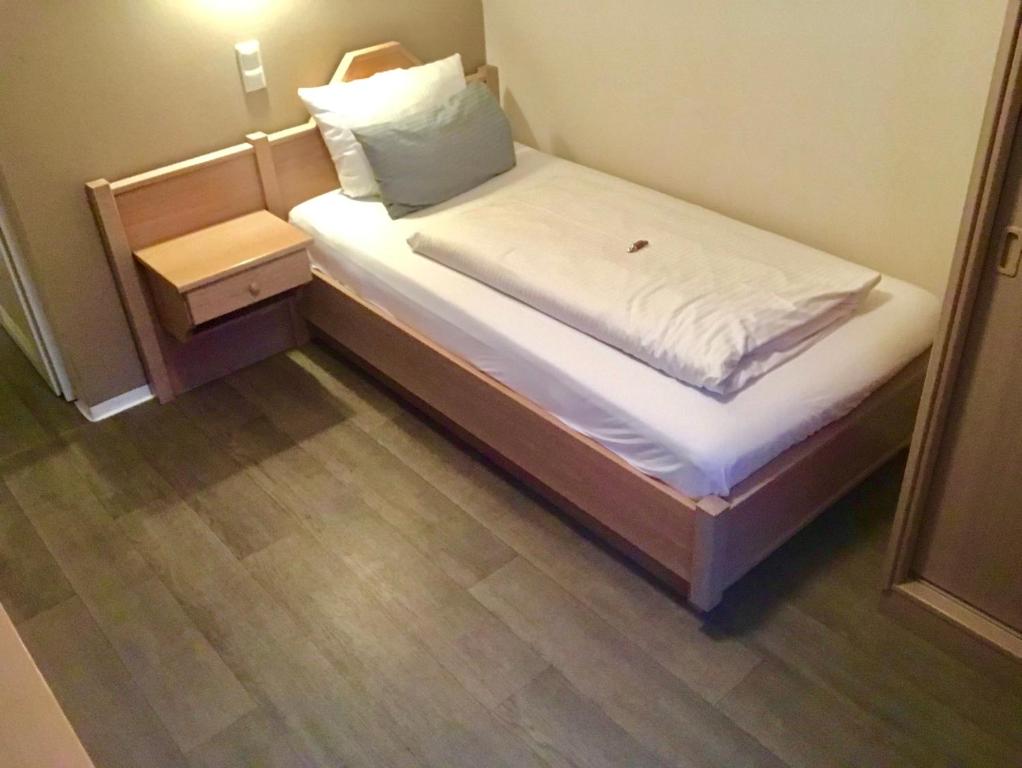 Postel nebo postele na pokoji v ubytování Gasthaus Schwan