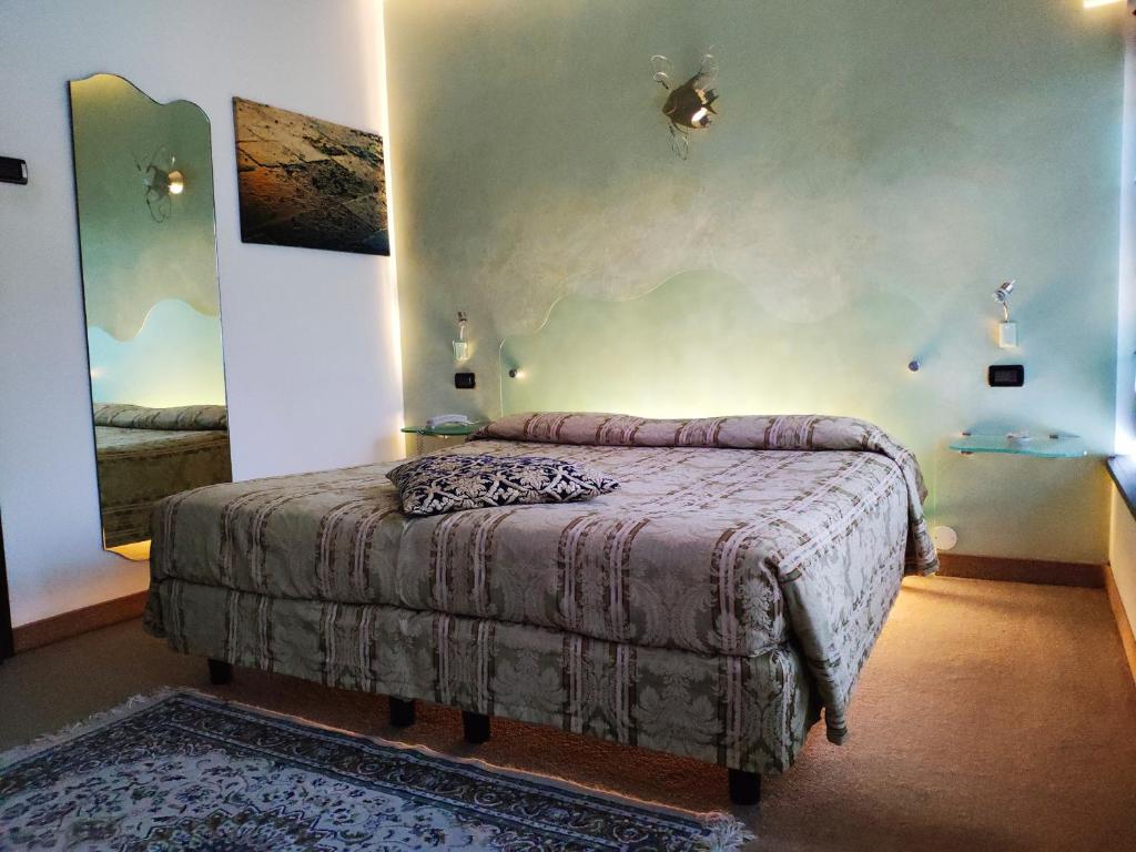 Postel nebo postele na pokoji v ubytování Hotel Feel Inn Venice Airport