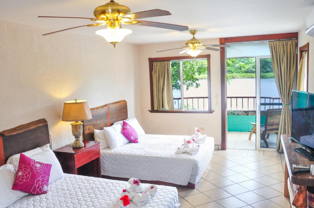 Lamanai Hotel & Marina - Habitación Cuádruple