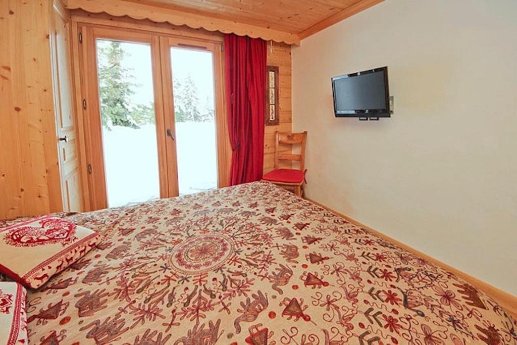 Postel nebo postele na pokoji v ubytování Chalet El Condor