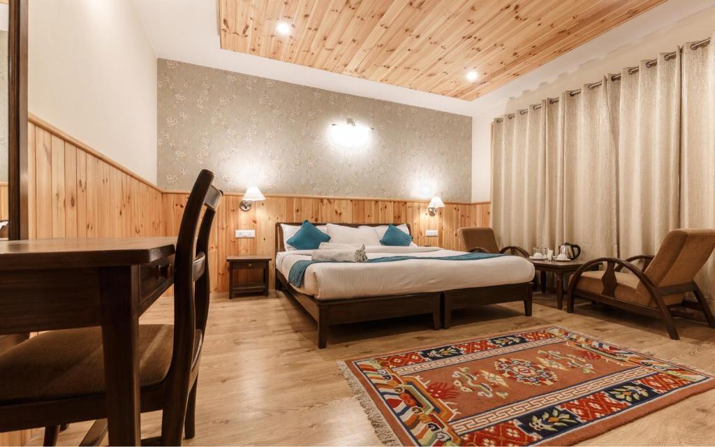 Postel nebo postele na pokoji v ubytování Hotel The Kaal