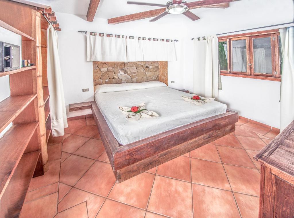 Postel nebo postele na pokoji v ubytování Villas Kalimba