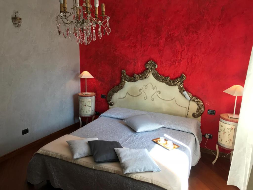 Postel nebo postele na pokoji v ubytování Il Sasso Bianco