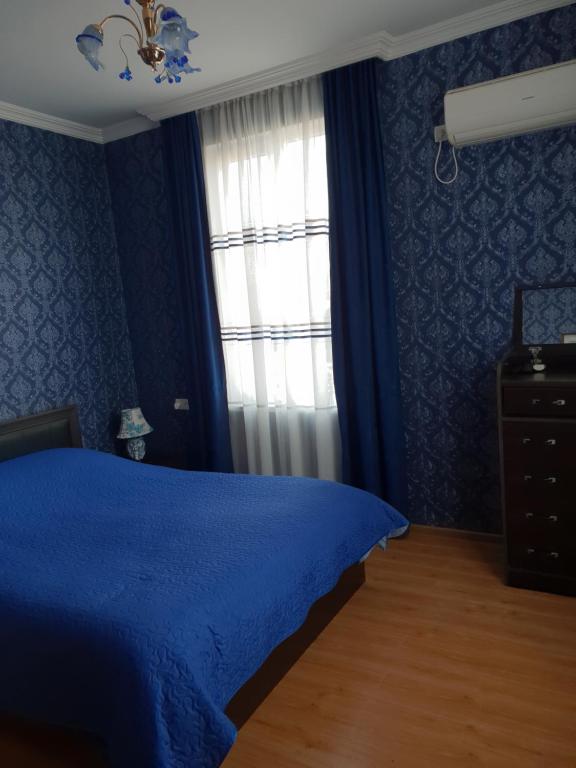 Postel nebo postele na pokoji v ubytování Guest House Kusika