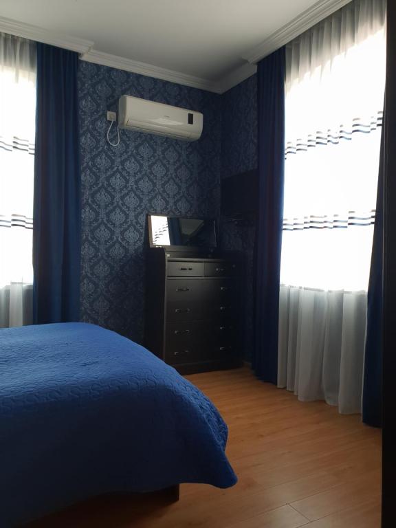 Postel nebo postele na pokoji v ubytování Guest House Kusika