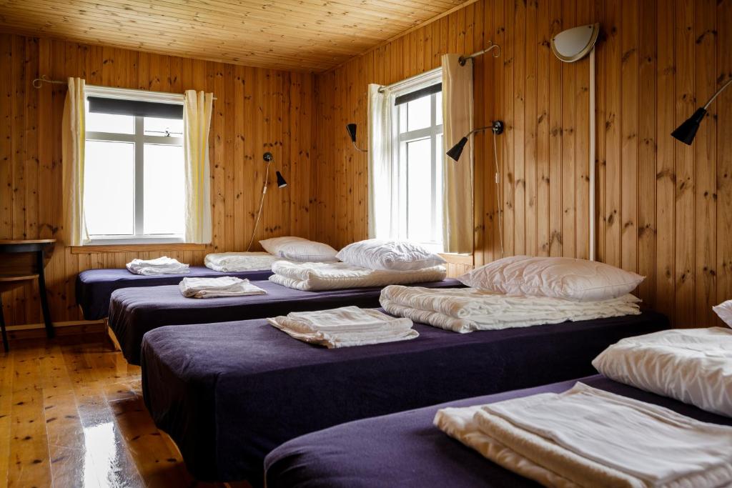 Postel nebo postele na pokoji v ubytování Ósar Hostel