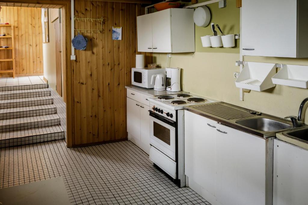 Kuchyň nebo kuchyňský kout v ubytování Ósar Hostel