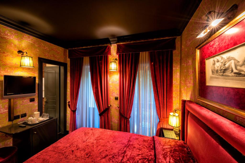 Posteľ alebo postele v izbe v ubytovaní Maison Grecque Hotel Extraordinaire