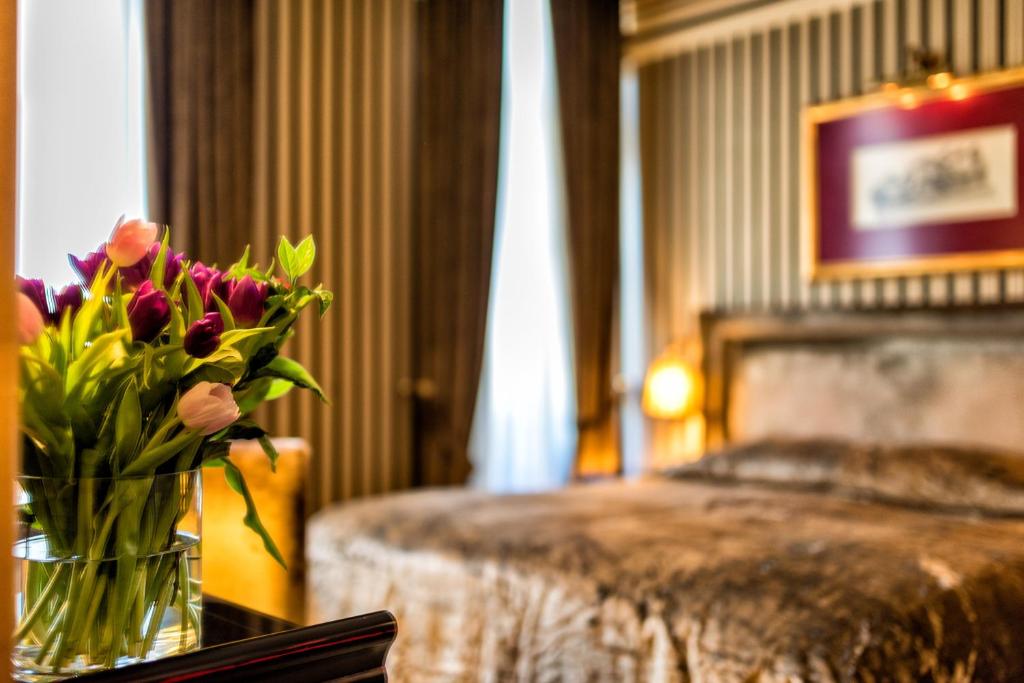 Posteľ alebo postele v izbe v ubytovaní Maison Grecque Hotel Extraordinaire