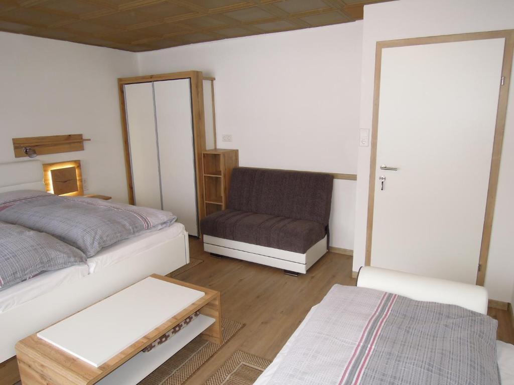 Postel nebo postele na pokoji v ubytování Salvesenheim