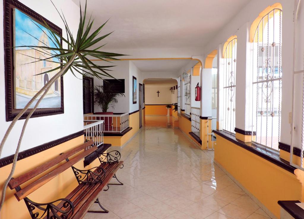 TV a/nebo společenská místnost v ubytování Hotel Valladolid