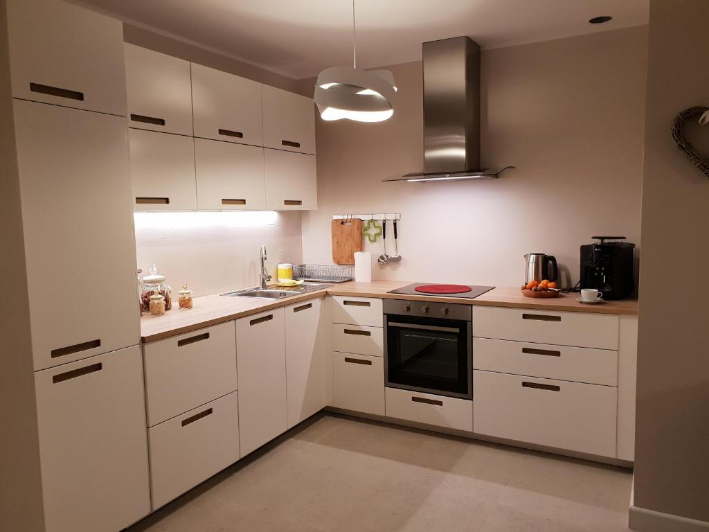 Kuchnia lub aneks kuchenny w obiekcie Apartament Widokowy - 5D Apartamenty