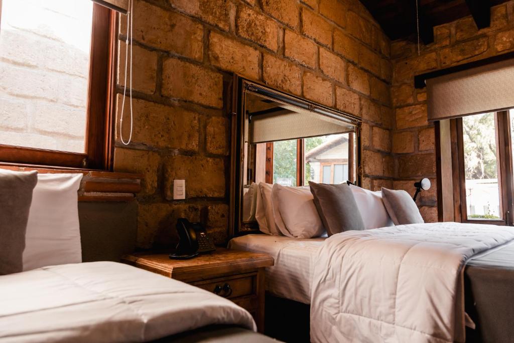 Postel nebo postele na pokoji v ubytování Hotel Sol y Fiesta