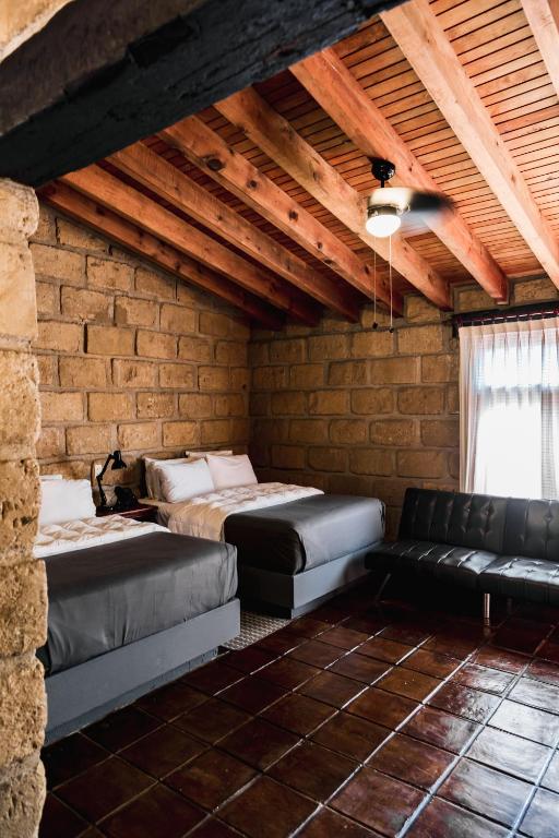 Postel nebo postele na pokoji v ubytování Hotel Sol y Fiesta