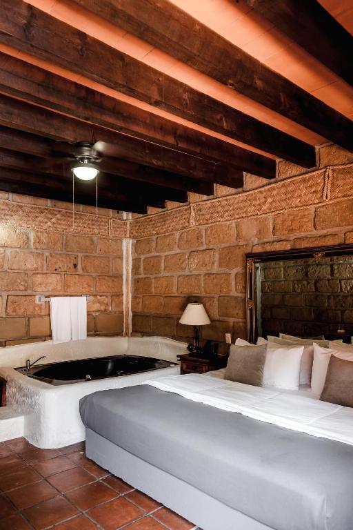 Postel nebo postele na pokoji v ubytování Hotel Sol y Fiesta
