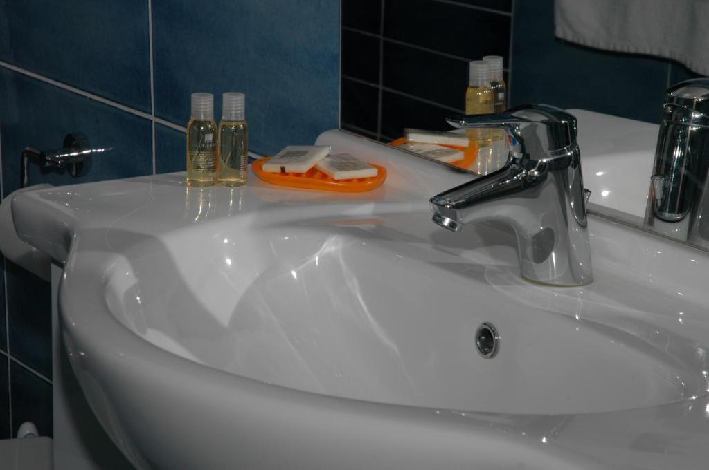 Koupelna v ubytování Hotel Côte D'Est