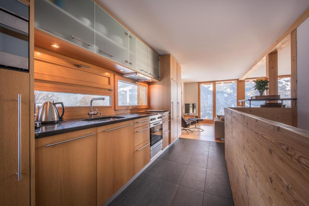Kuchyň nebo kuchyňský kout v ubytování Chalet Roossi 3
