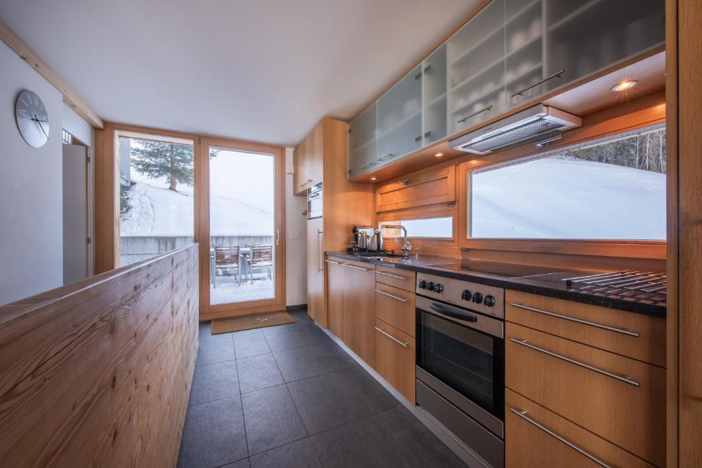 Kuchyň nebo kuchyňský kout v ubytování Chalet Roossi 3