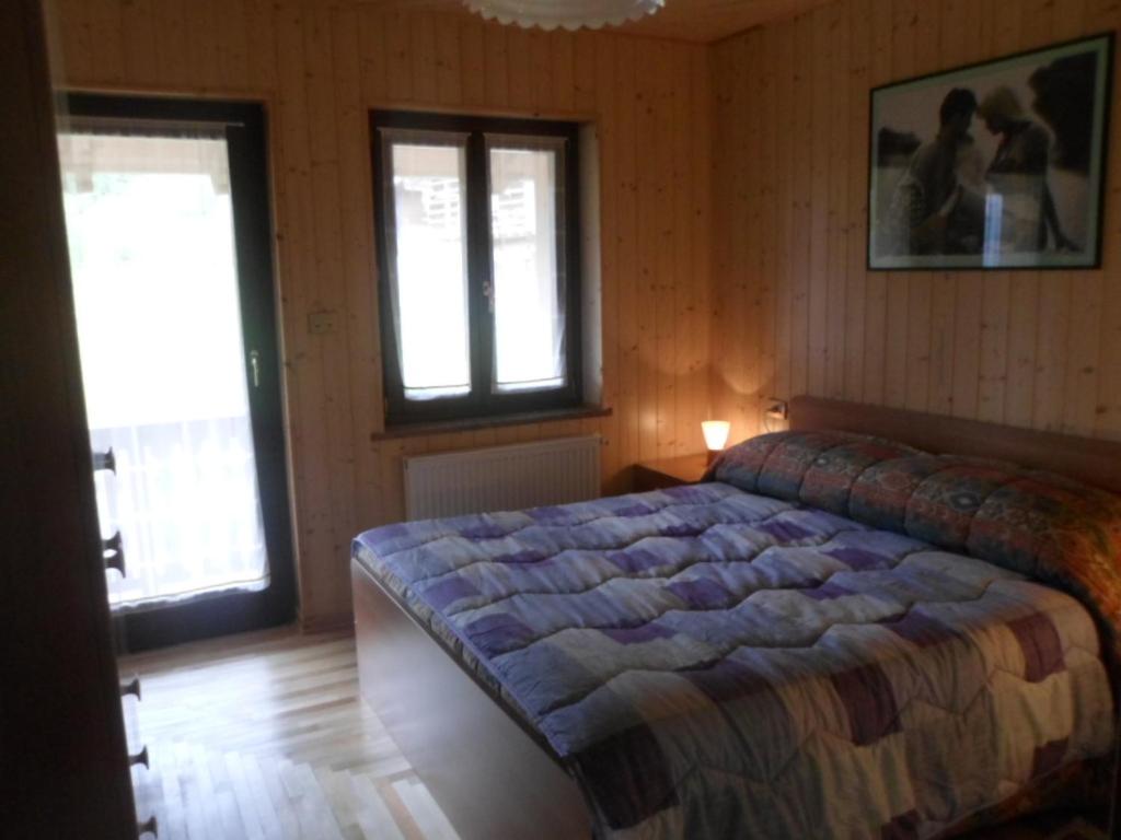 Postel nebo postele na pokoji v ubytování Albergo Riglarhaus