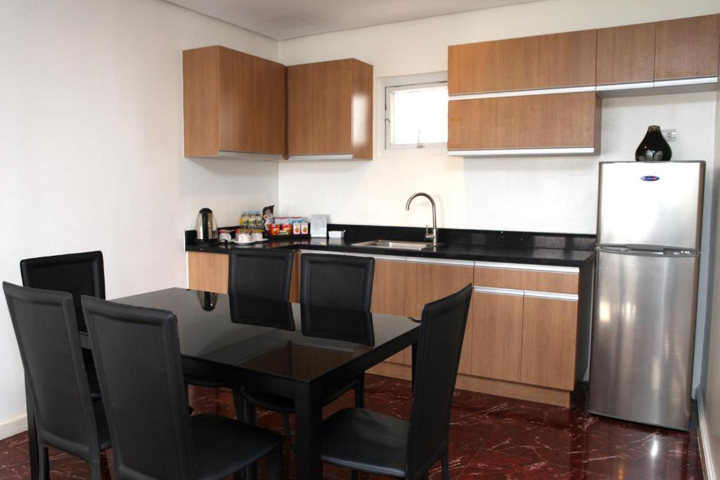 Kuchyň nebo kuchyňský kout v ubytování Centtro Residences