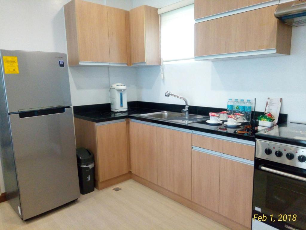 Kuchyň nebo kuchyňský kout v ubytování Centtro Residences