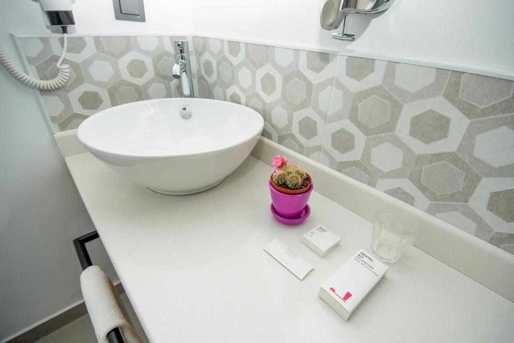 Koupelna v ubytování Hotel Adora