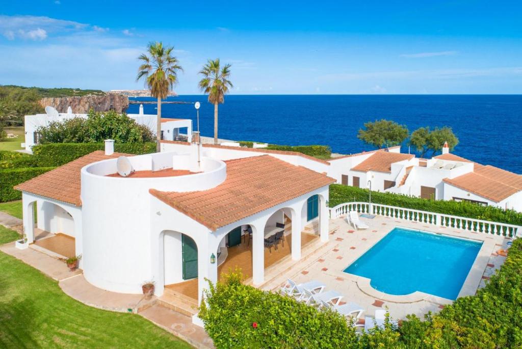 an aerial view of a house with a swimming pool at Villa Caprice in S'Algar