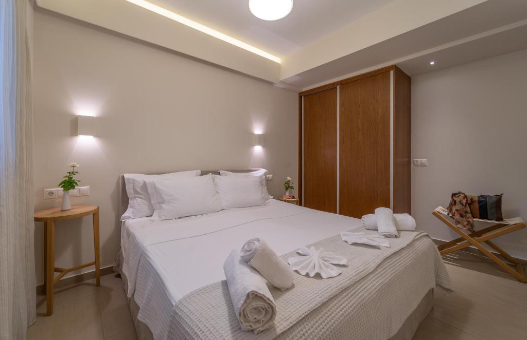 Postel nebo postele na pokoji v ubytování Abelia Luxurious Villas