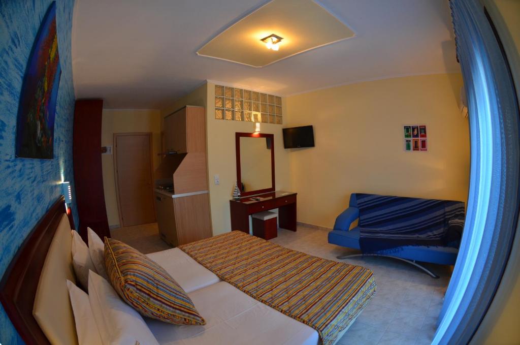 Postel nebo postele na pokoji v ubytování Glikadi Hotel