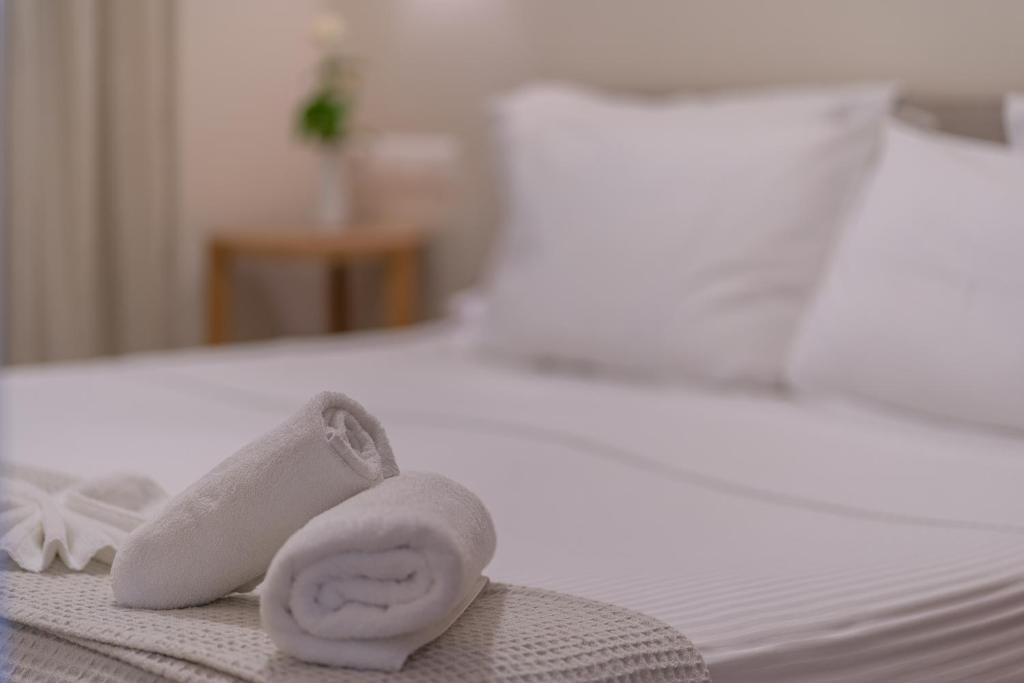 Postel nebo postele na pokoji v ubytování Abelia Luxurious Villas