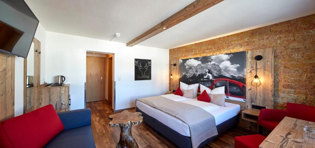 Postel nebo postele na pokoji v ubytování Hotel Rustika