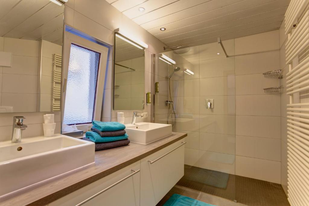 Kúpeľňa v ubytovaní Am Dorfplatz Suites - Adults only